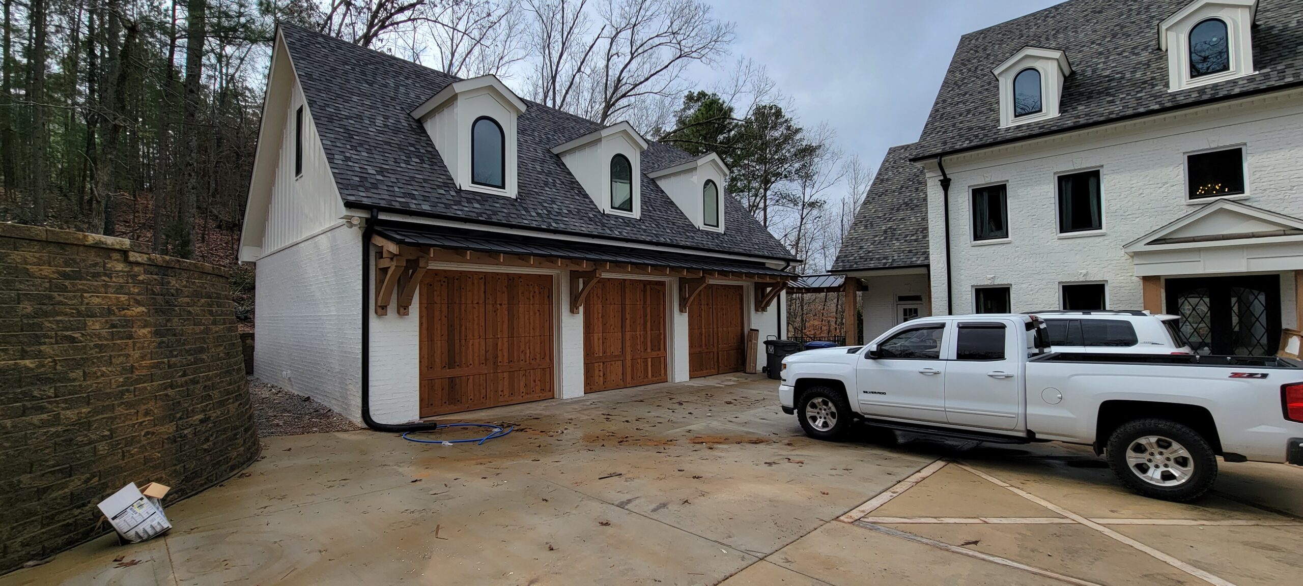 Custom wood garage door with overlay