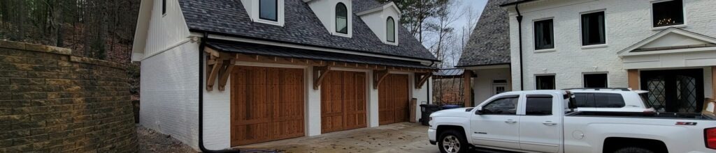 Custom wood garage doors with an overlay